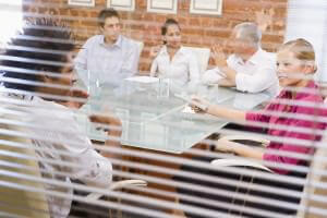 bigstockphoto_Five_Businesspeople_In_Boardro_4132494