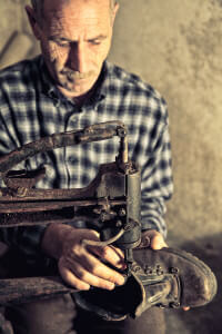 cobbler-at-work-with-old-tools