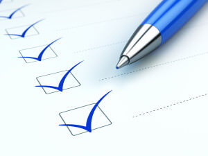 Checklist concept: checklist, paper and blue pen